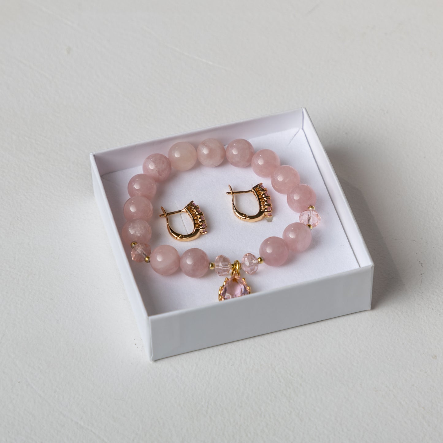 Madagascar Rose Quartz bracelet set with decorative crystals earrings