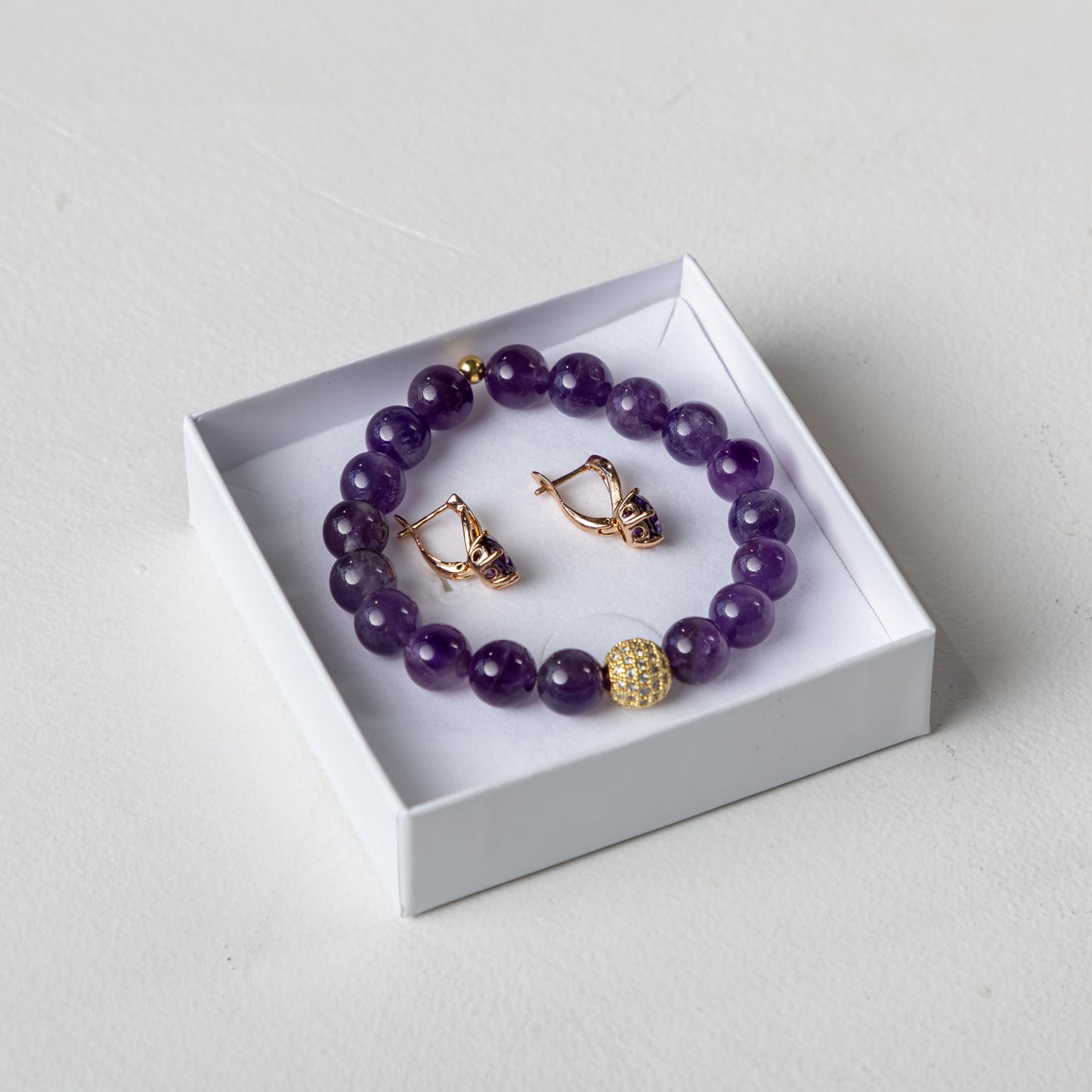 Amethyst bracelet set with decorative crystals earrings
