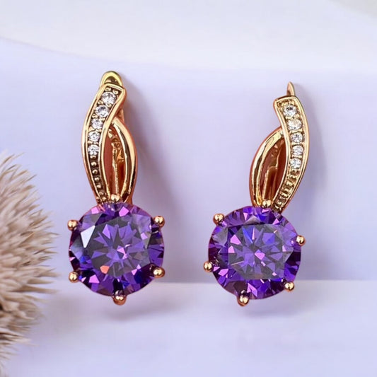 Gold Plated Stainless Steel Earrings with decorative purple crystal