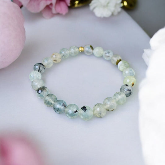 Prenīta rokassprādze (Prenīts, slīpēta forma,8mm. Enerģijai, priekam un sapņu piepildīšanai.)